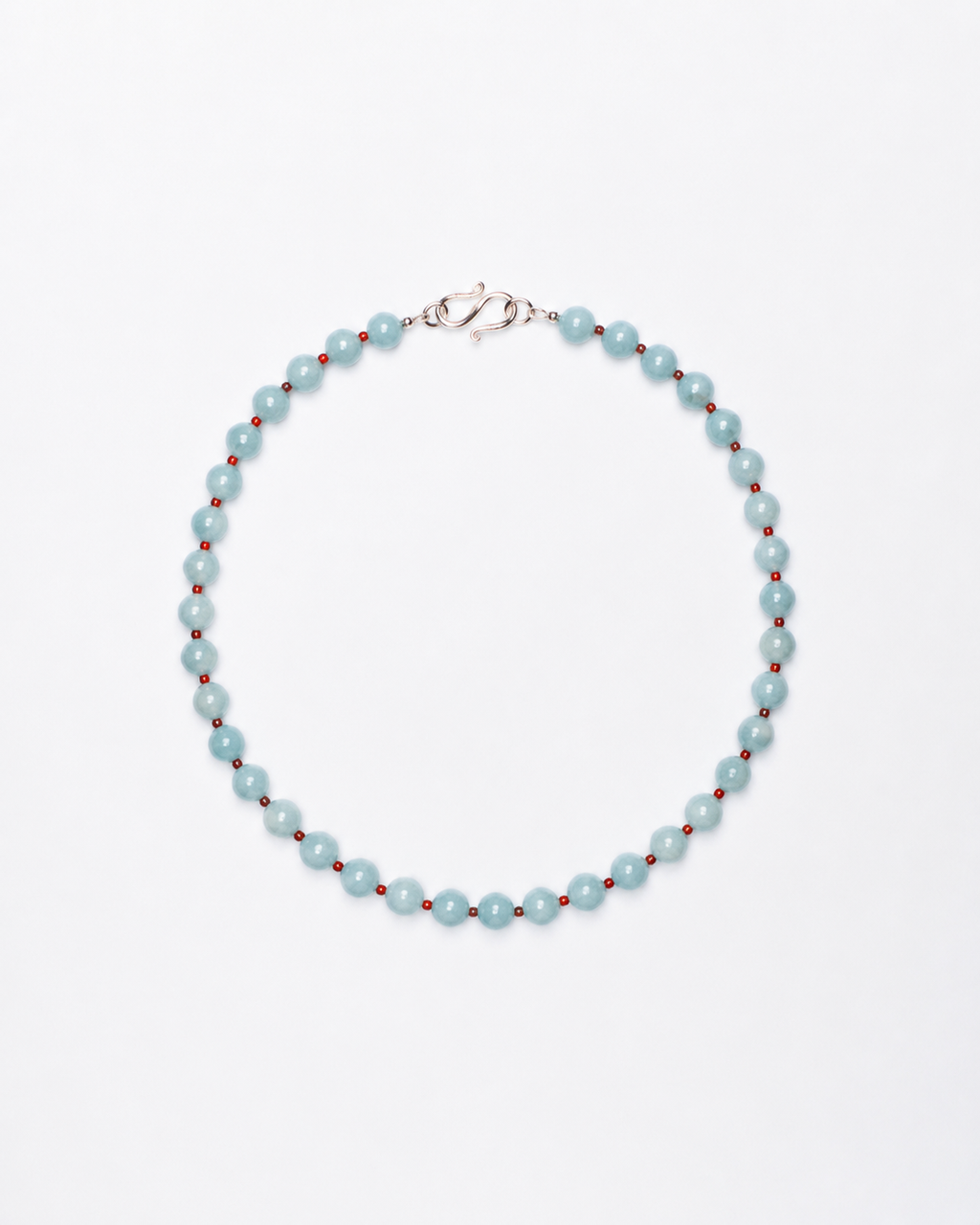 Necklace with light blue beads on a white background